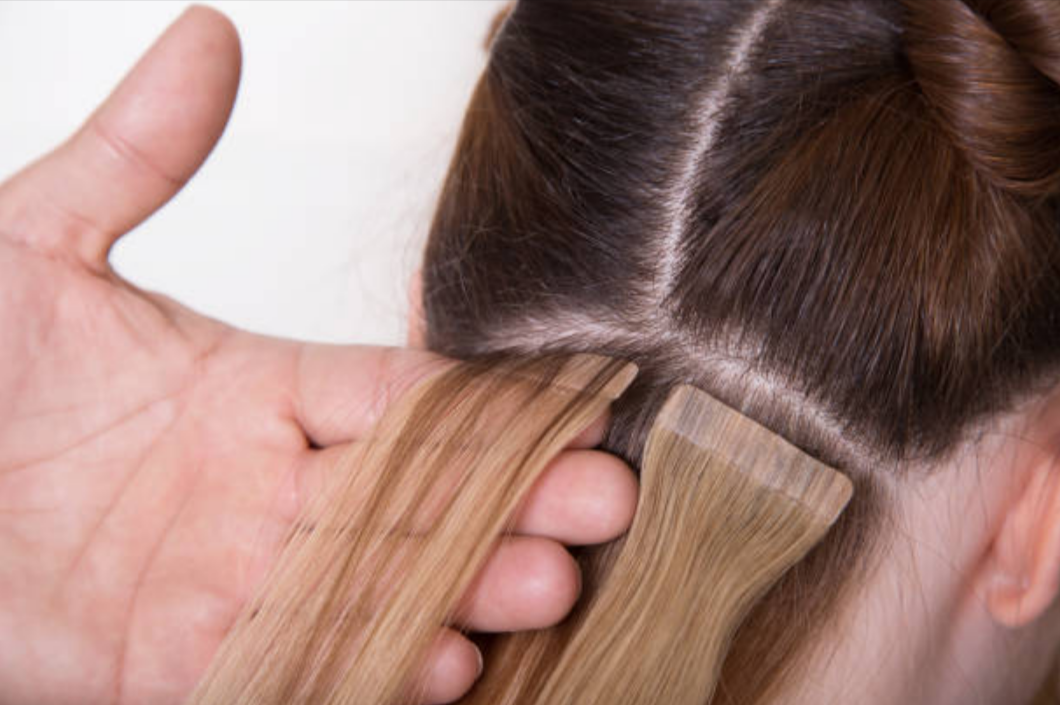 Attaching hair outlet extensions